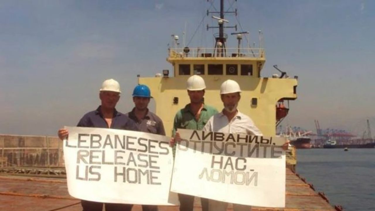 Captain Boris Prokoshev and the other stranded crewmembers aboard the MV Rhosus. Via Marine Insight.